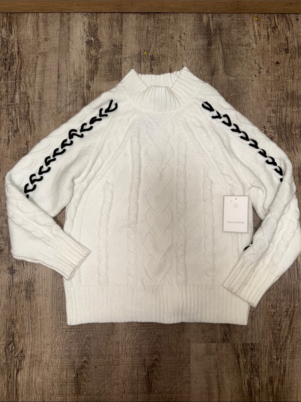 Caligraphie White Cable-Knit Turtleneck Sweater with Black Lace Trim